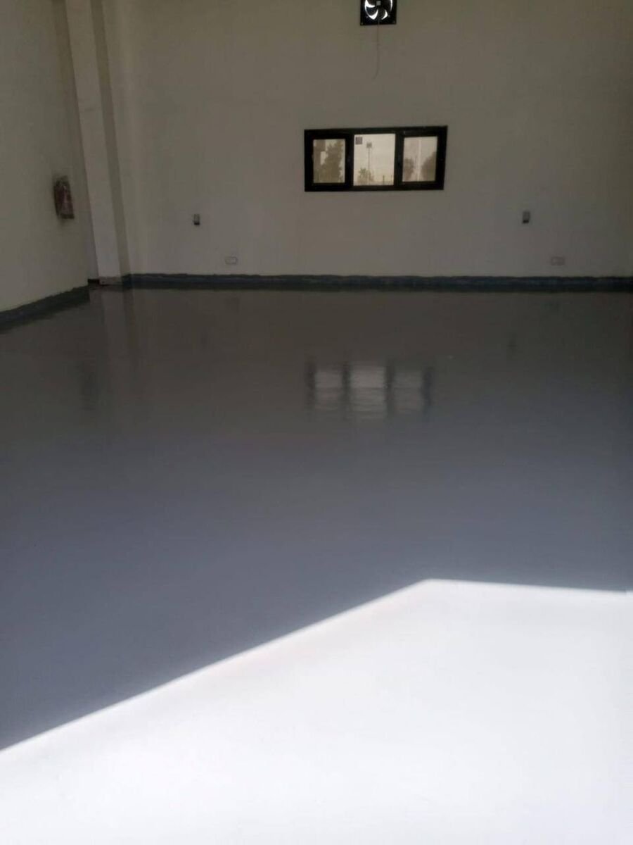 Large hall floor laid in a single pour for an unbroken finish.