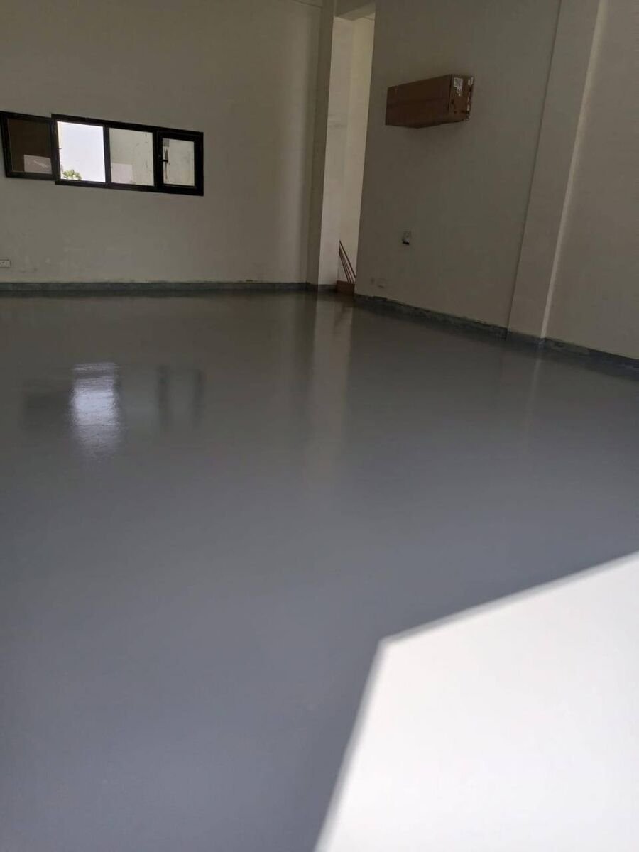 Finished epoxy floor, levelled and sealed wall to wall.